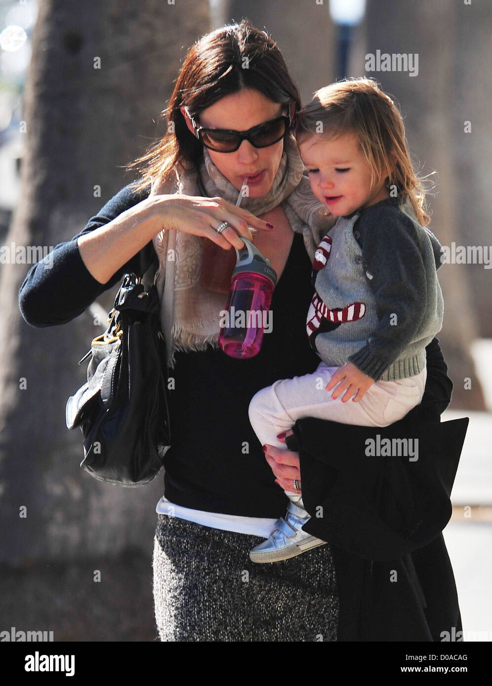 Jennifer Garner carries her daughter Seraphina Mother and daughter looked happy walking in the sunshine Santa Monica, Stock Photo