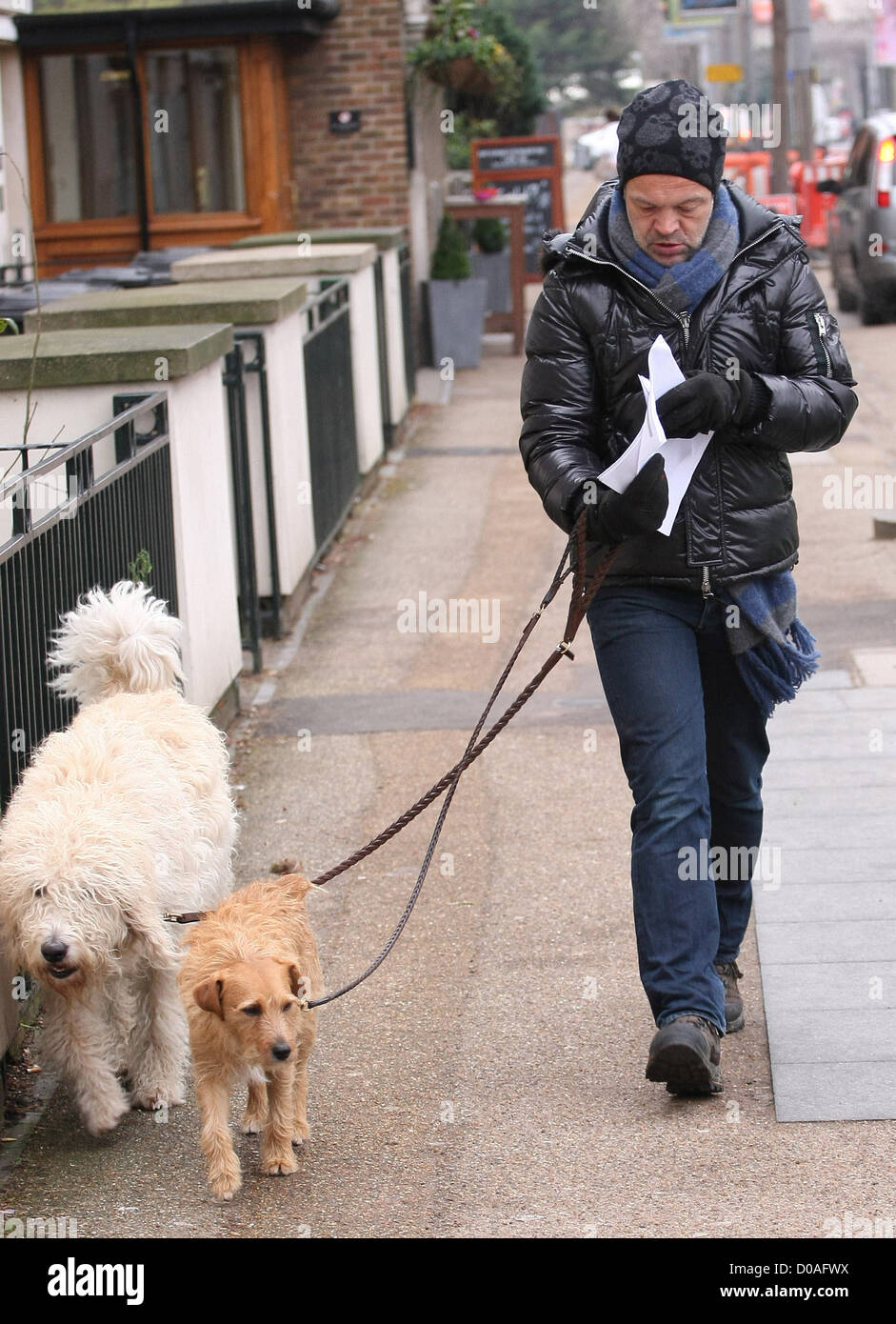Graham Norton walks his dogs outside the ITV studios London, England