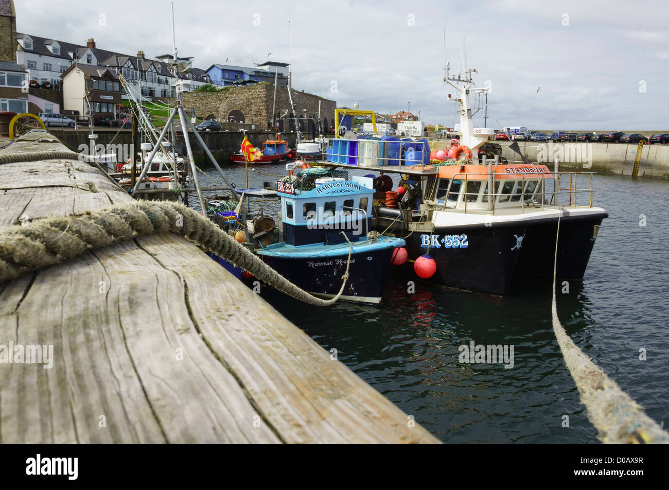 Fishing trawlers at Seahouses harbor in Northumberland. Stock Photo