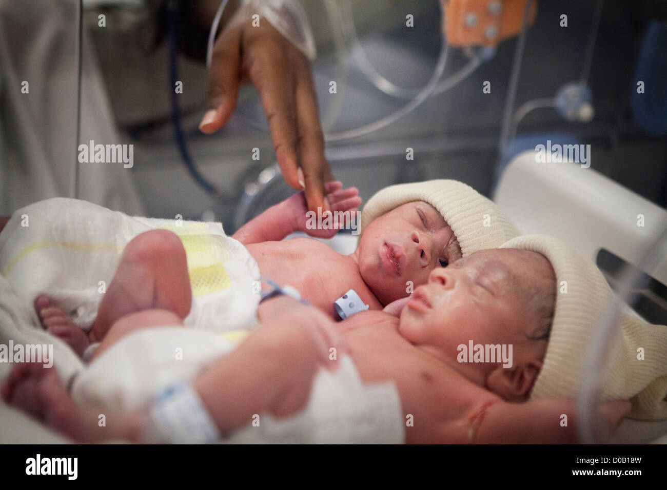 Maternal twins hi-res stock photography and images - Alamy