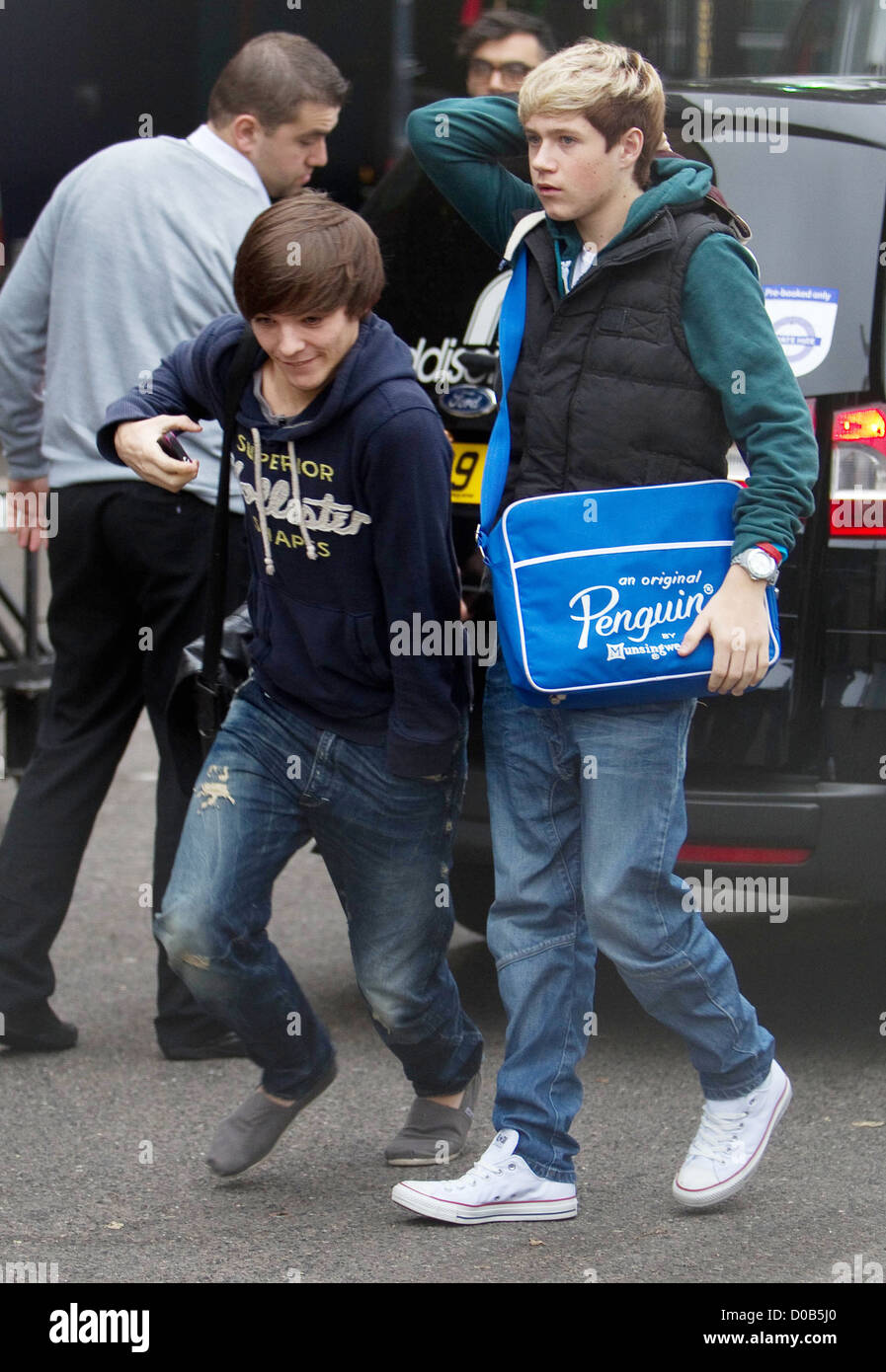 Louis Tomlinson And Niall Horan From Boy Band One Direction The X Factor Finalists Arrive At The Studios Ahead Of Tonight S Stock Photo Alamy