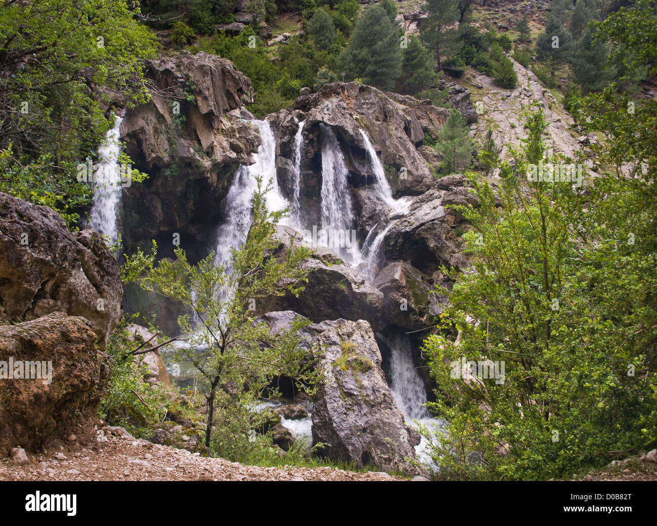 Hiking in Sierrra de Cazorla nature reserve in Andalusia Spain, waterfall in the rio Borosa river Stock Photo