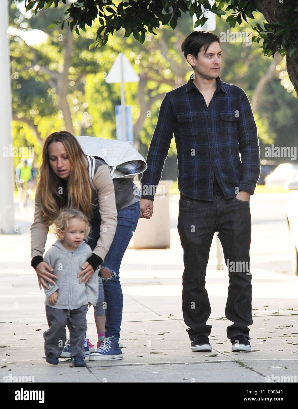 Tobey Maguire and his wife Jennifer Meyer with their son, Otis Tobias