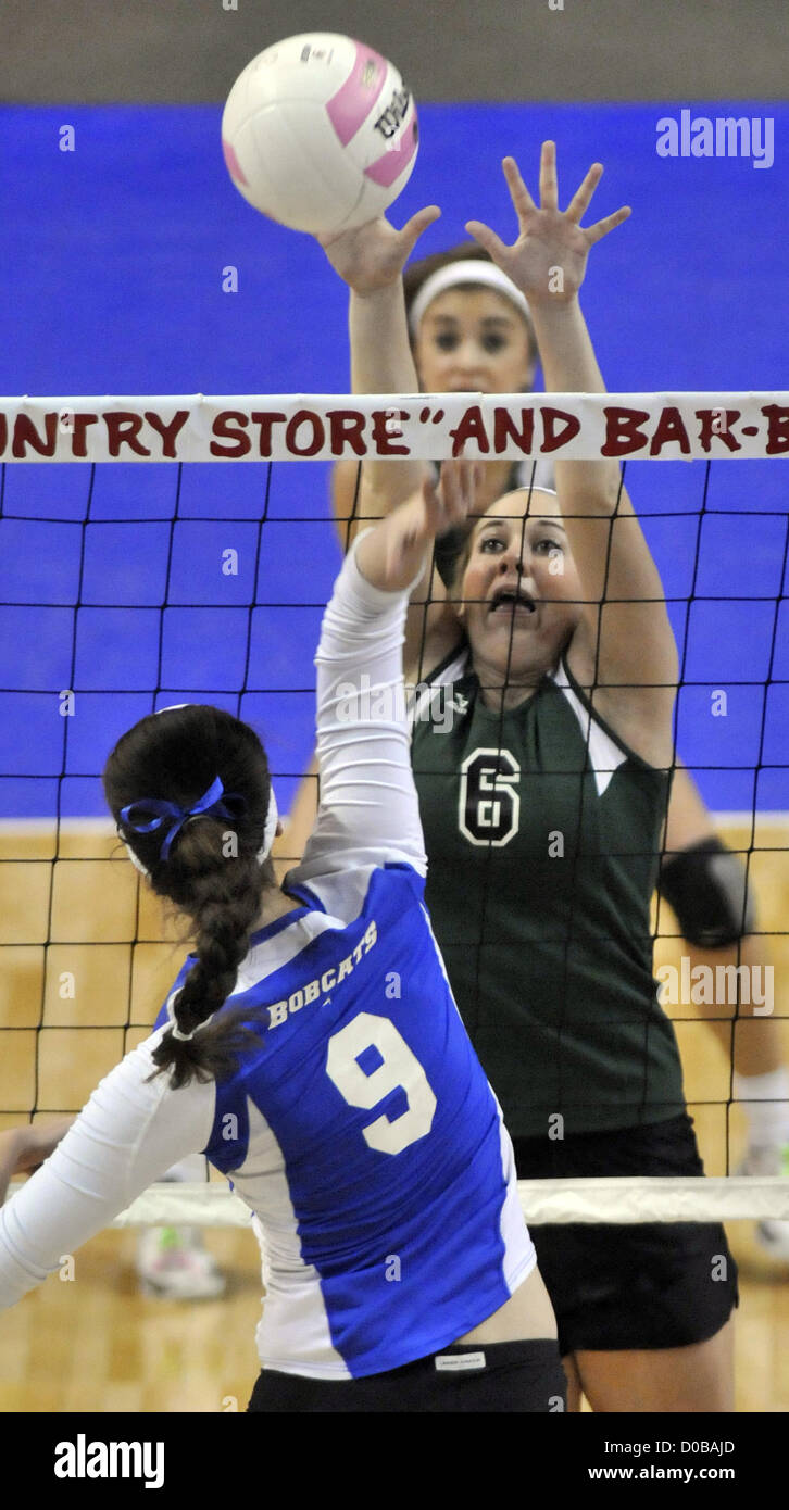 Nov. 17, 2012 - Rio Rancho, NM, U.S. - Greg Sorber -- Texico's Rae Lynn Prather, 6, jumps to block the shot of  Bosque's Alex Corcoran, 9, during the 2A state volleyball championship game at the Santan Ana Star Center on Saturday, November 17, 2012. (Credit Image: © Greg Sorber/Albuquerque Journal/ZUMAPRESS.com) Stock Photo