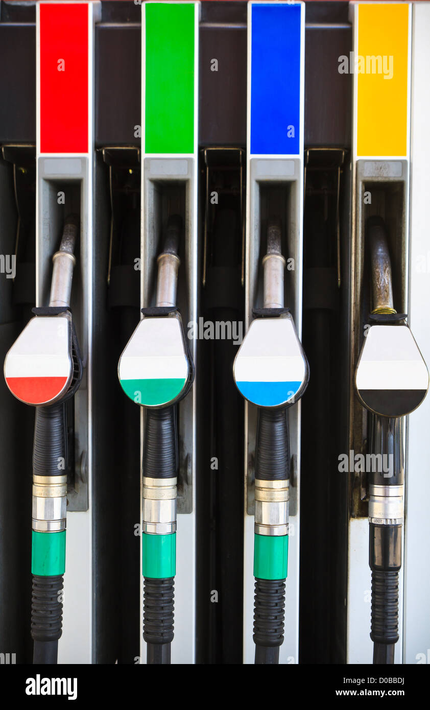 Gasoline pump nozzles at petrol station (petrol pump details) Stock Photo