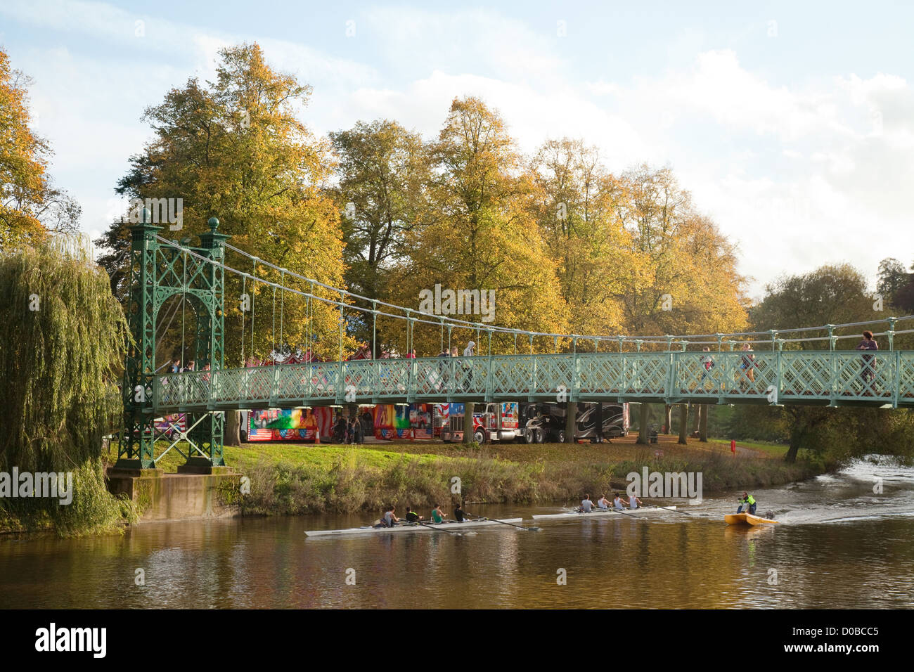Rowing on the River Severn at the Porthill footbridge, Shrewsbury