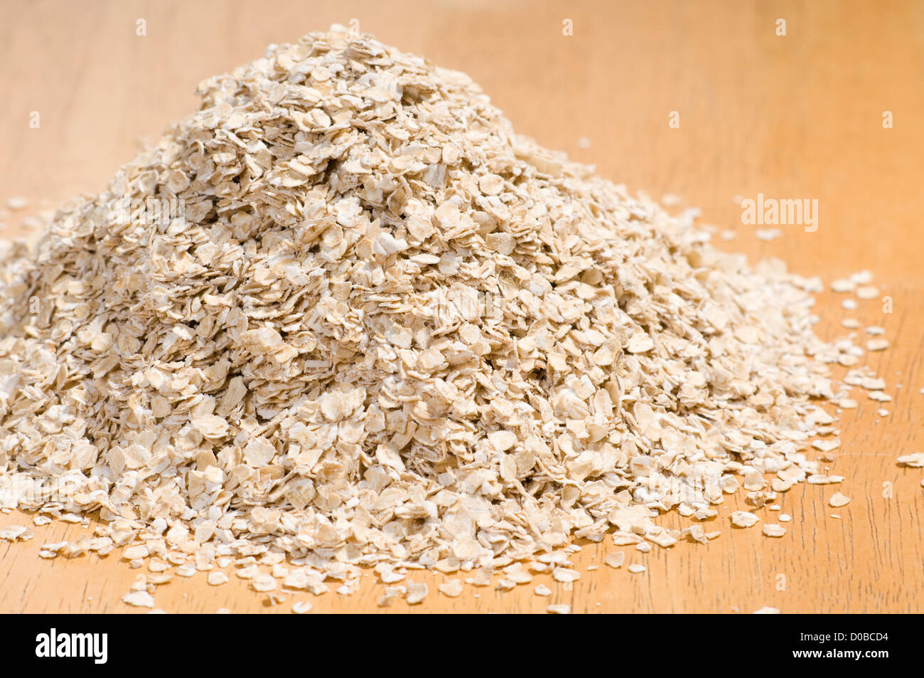 Pile of dried rolled oat flakes spilled Stock Photo