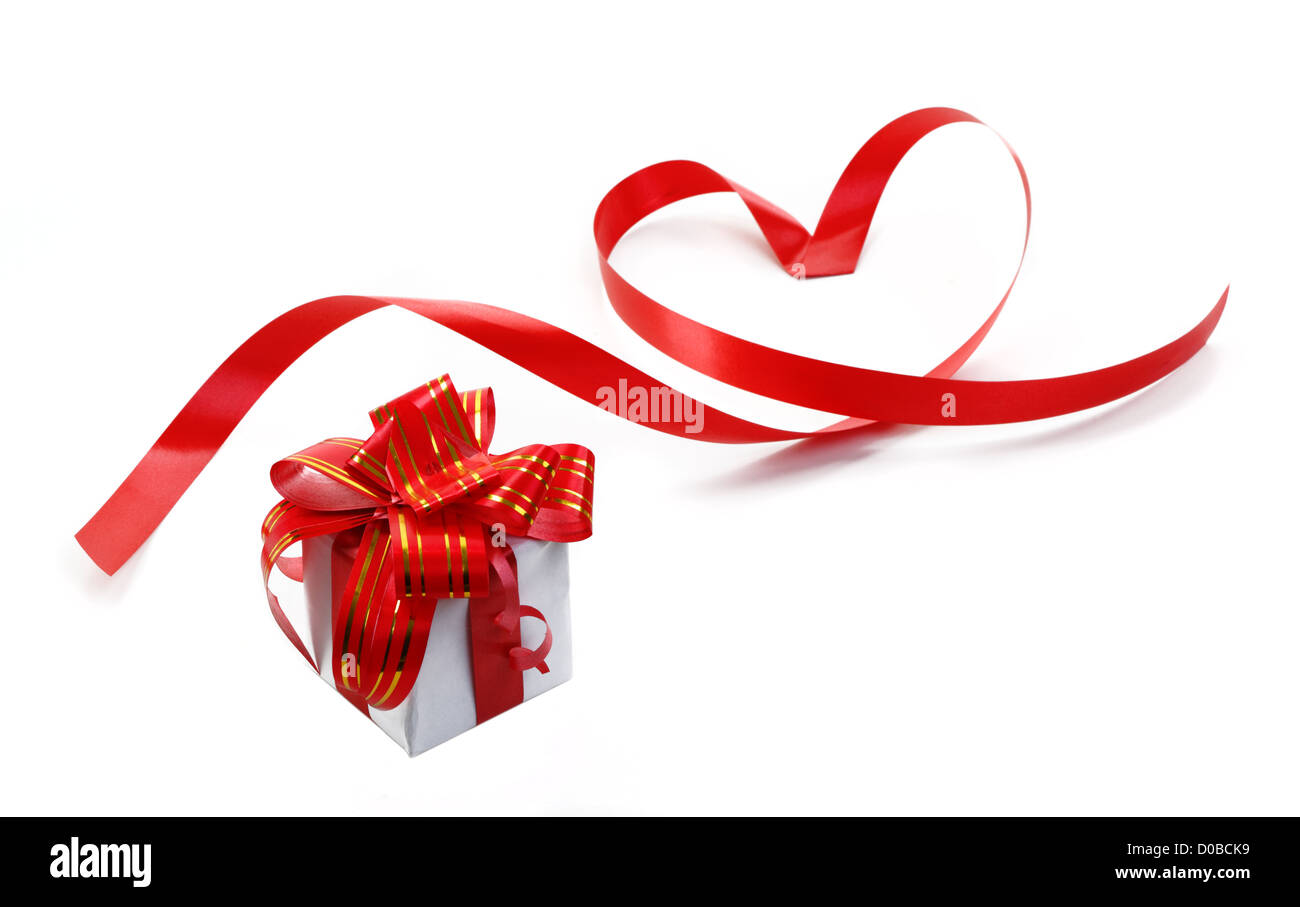 gift box with red bow isolated on white Stock Photo - Alamy