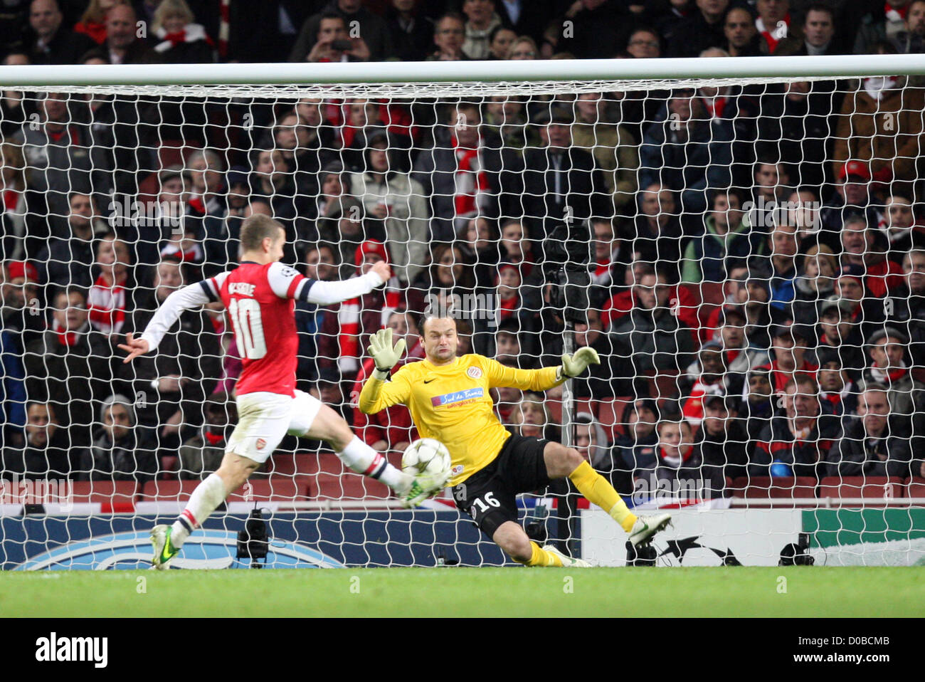 21.11.2012 London, England.  Jack Wilshere of Arsenal scores during the Champions League Group B game between Arsenal and Montpellier HSC from Emirates Stadium. Stock Photo