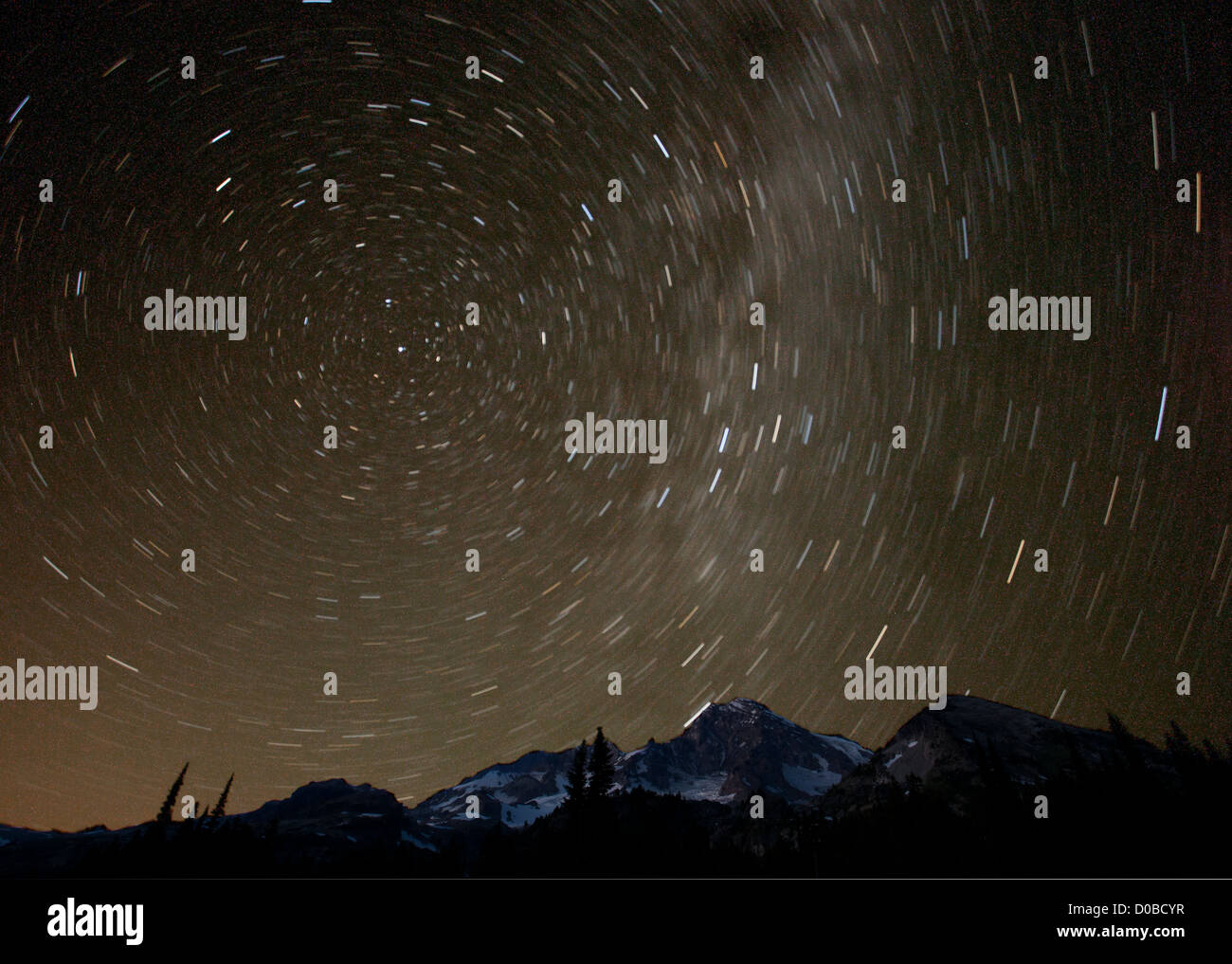 WASHINGTON - Night image of Mount Rainier and stars in Mount Rainier National Park. Stock Photo