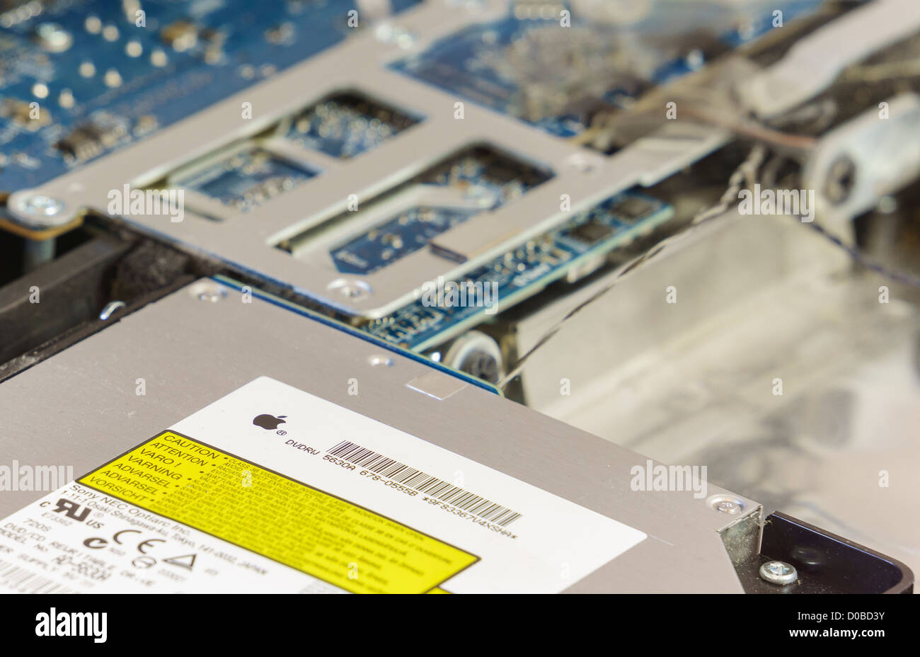 A shallow depth of field view of the DVD drive inside an iMac. Stock Photo