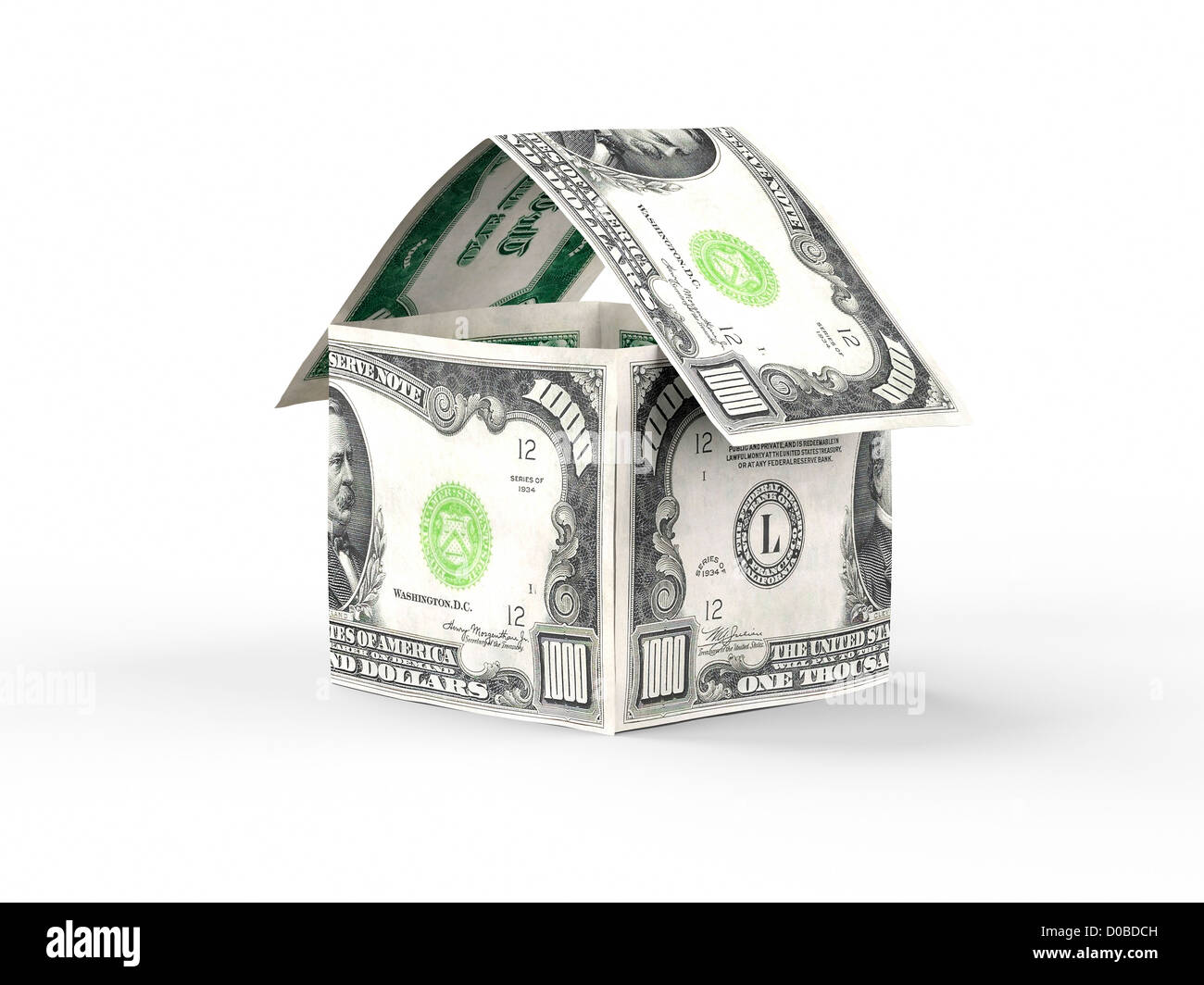 House made of money, thousand US dollar bills isolated on white background Stock Photo