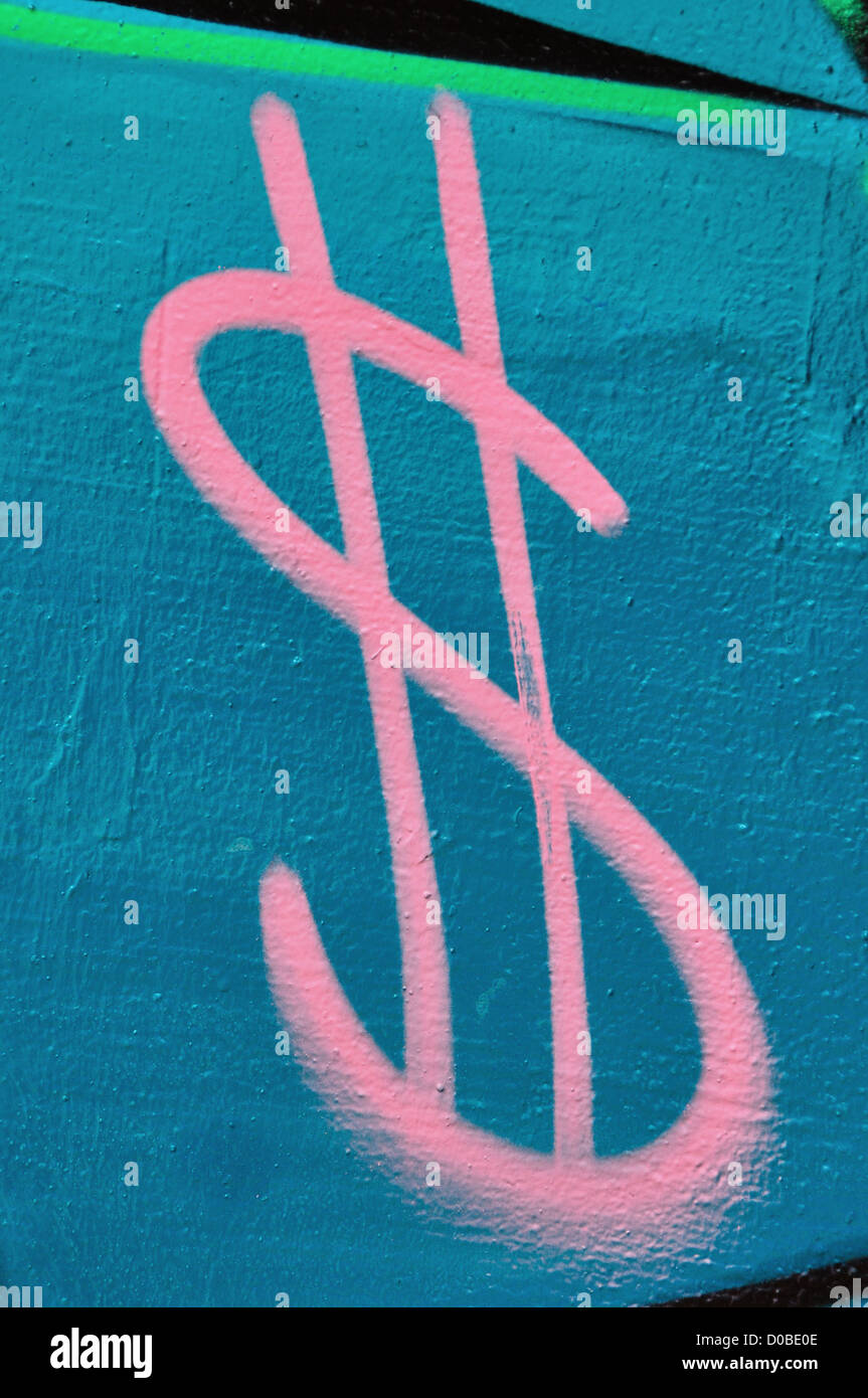 Dollar symbol colorful graffiti urban wall background. Stock Photo