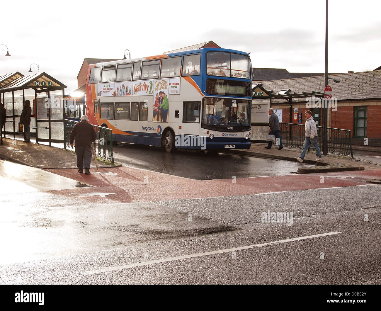 British buses on a wet day in town, November 2012 Stock Photo