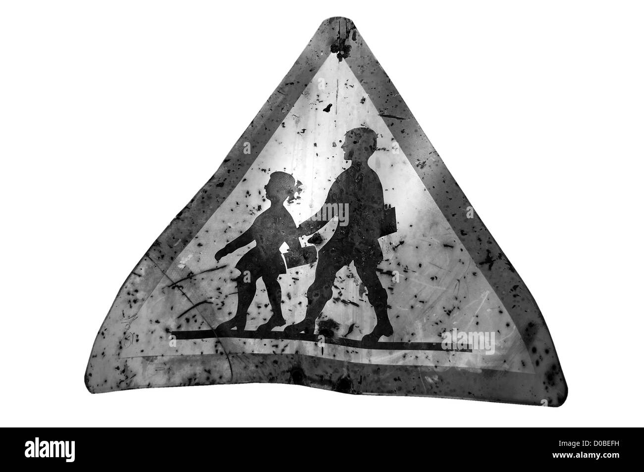 Rusty warning sign for school children. Black and white. Stock Photo