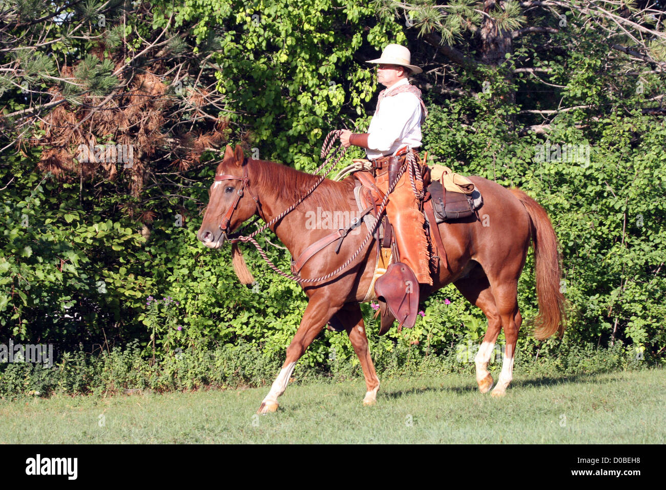 Man riding horse past western hi-res stock photography and images - Alamy
