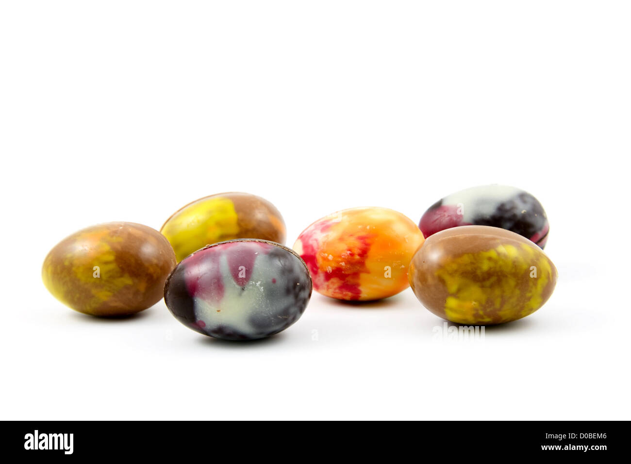 colorful chocolate eggs isolated on white background Stock Photo - Alamy