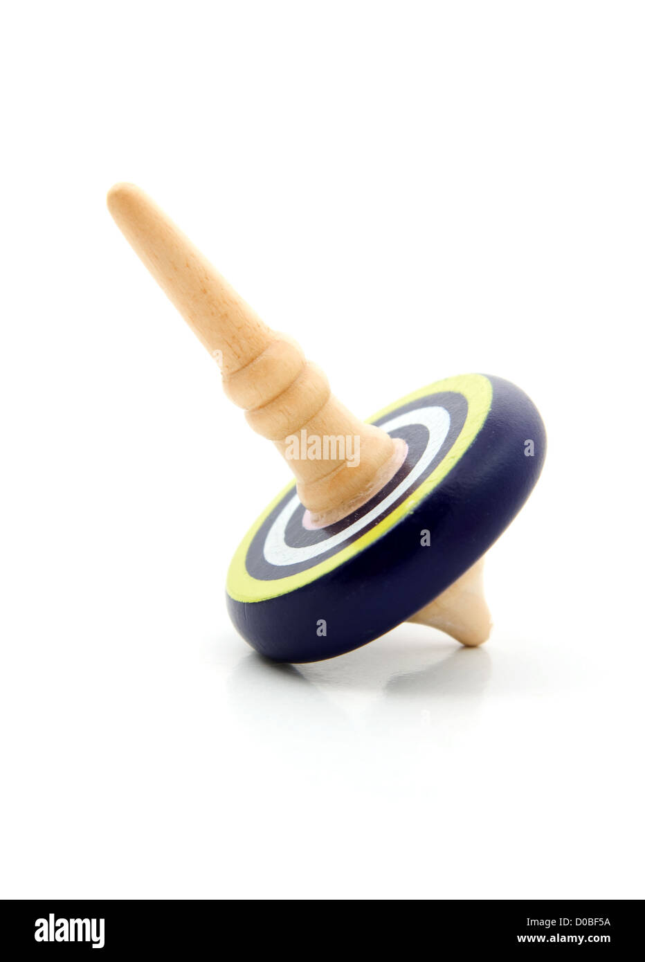 one blue spinning top isolated on white background Stock Photo Alamy