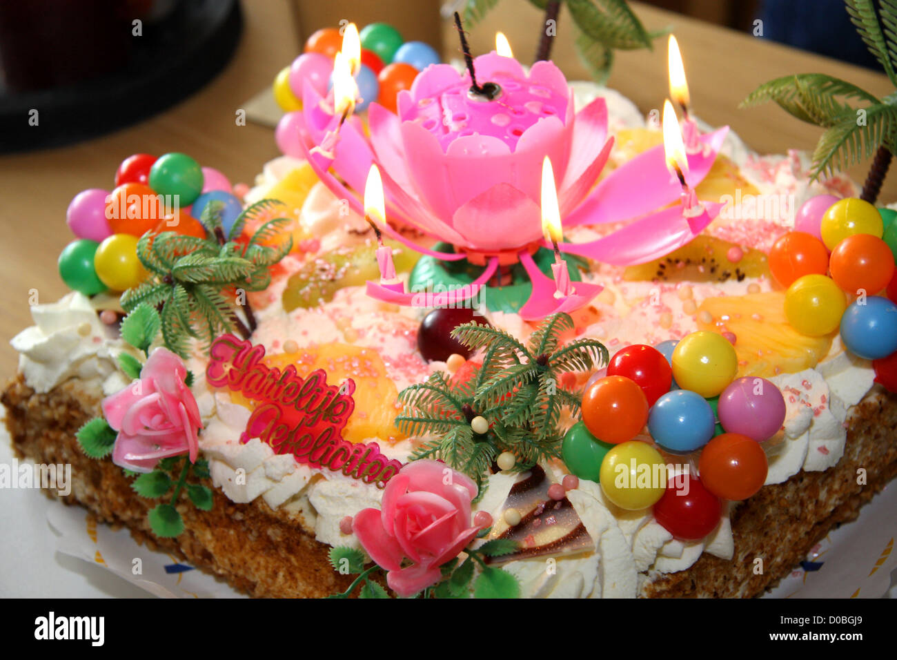 colorful birthday cake with candles Stock Photo - Alamy