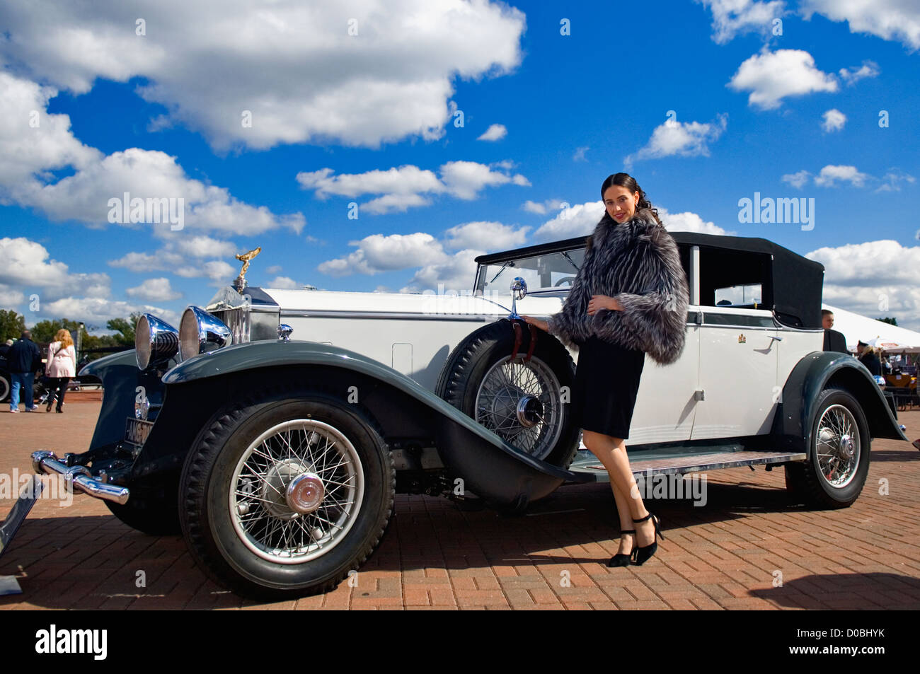 Model in Period Clothing Posing beside Vintage Packard at the Concours d'Elegance at Churchill Downs in Louisville, Kentucky Stock Photo