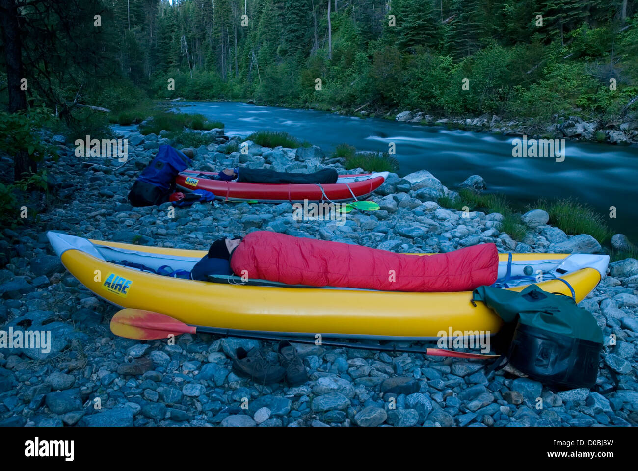 Sleeping in inflatable kayaks on a trip down the North Fork of the