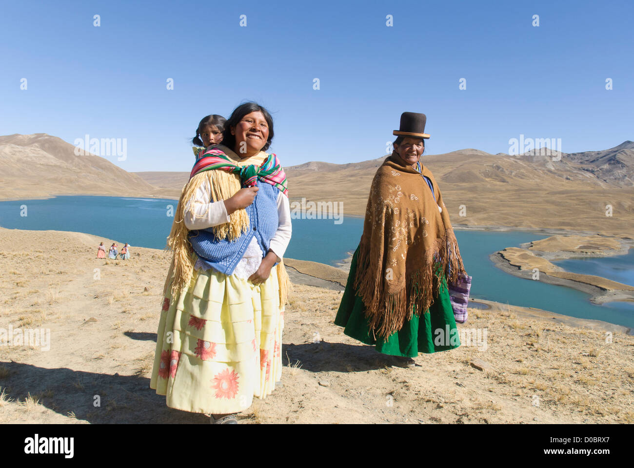 Magical Andes Photography  Aymara woman shopping for red and yellow  underwear on New Year's Eve, La Paz, Bolivia photograph