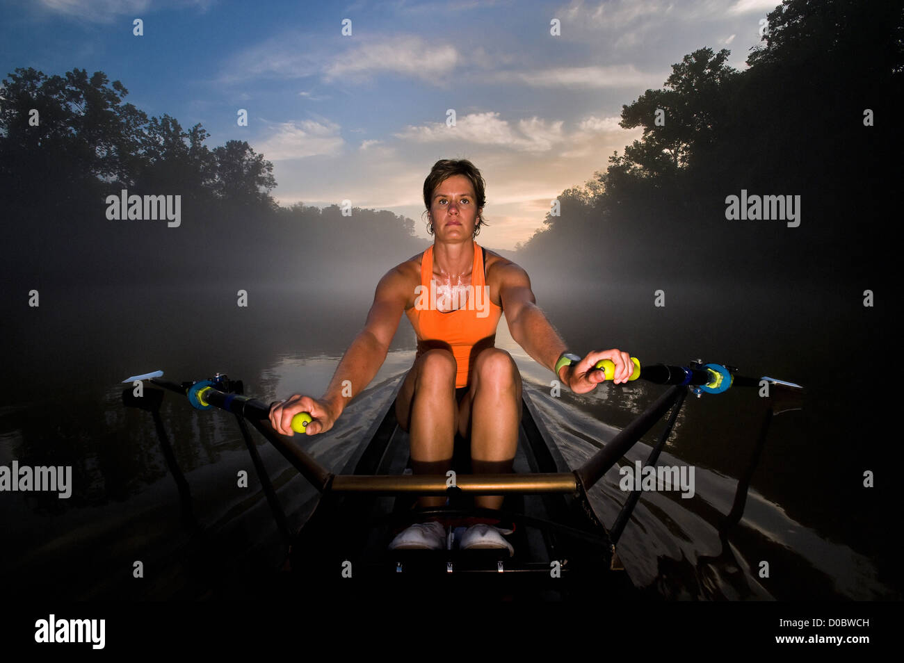 Rowing Shell Red Woman in Rowing Shell Stock Photo - Alamy