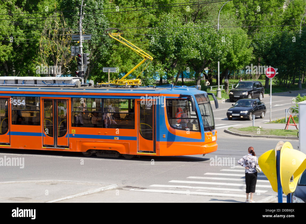 Tram crossing an intersection, Perm, Russia Stock Photo