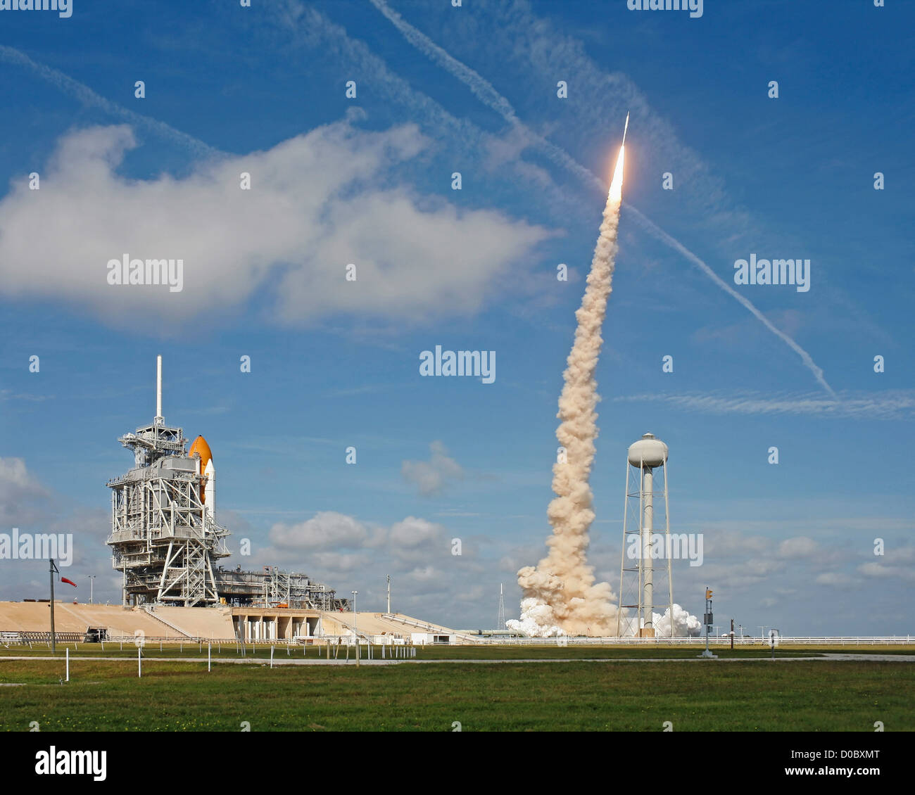 Ares I-X Test with Nearby Space Shuttle Stock Photo