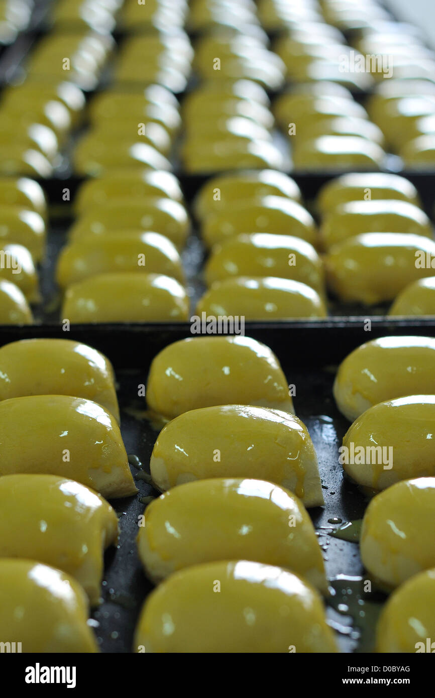 Naples. Italy. Sfogliatelle ready for the oven, traditional neapolitan cakes at Antica Pasticceria Carraturo. Stock Photo