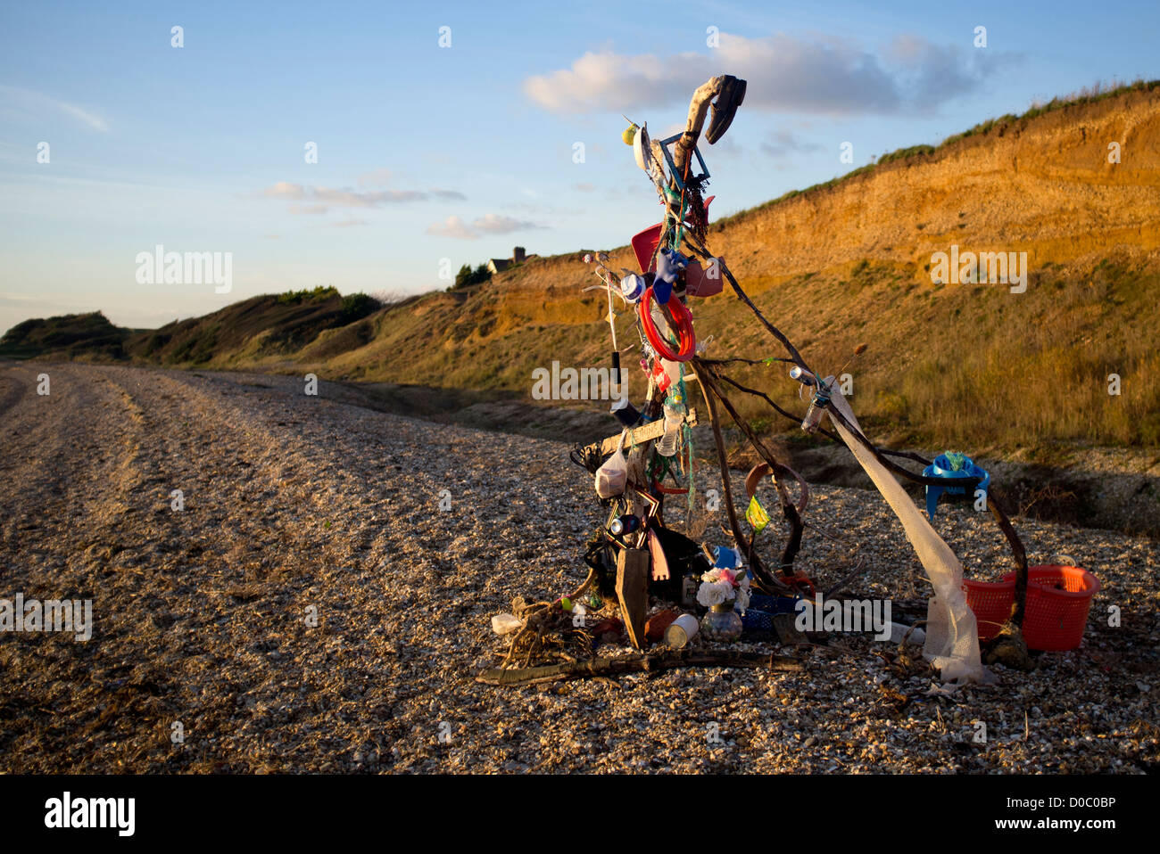 shrine on a beach made from rubbish Stock Photo
