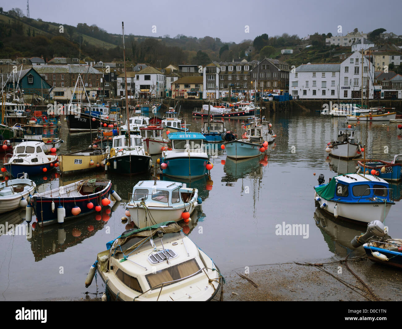 Mevagissey, Cornwall. The inner harbour at dusk of the picturesque fishing village on the south Cornish coast. Stock Photo