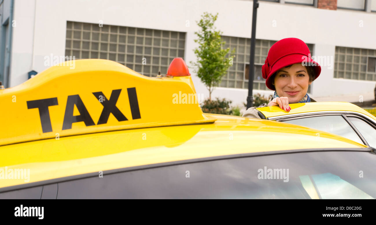 A Beautiful Woman Gets In The Cab Stock Photo - Alamy