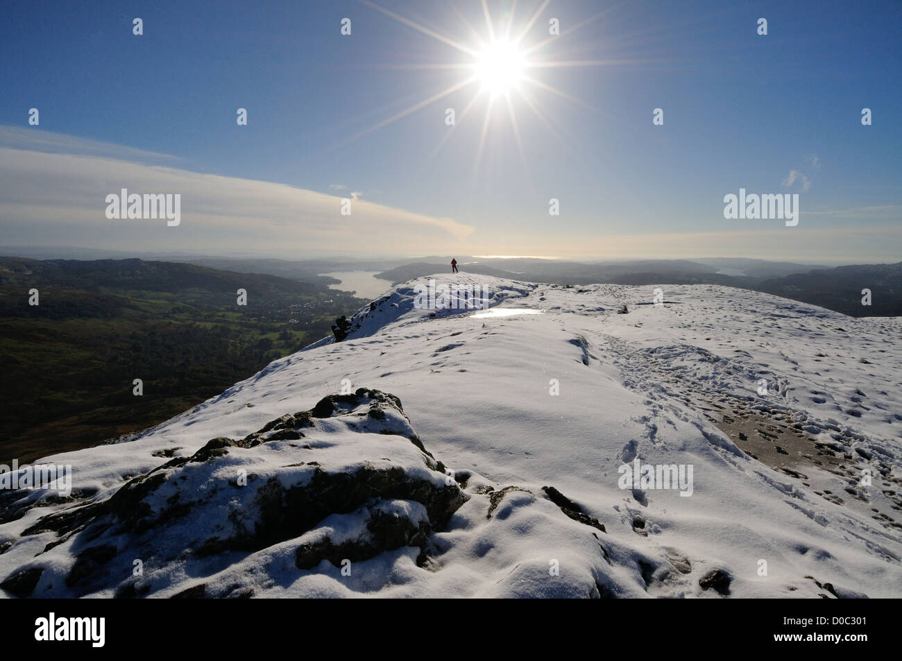 Winter sun over Heron Pike in winter in the English Lake District, with Windermere in the background Stock Photo
