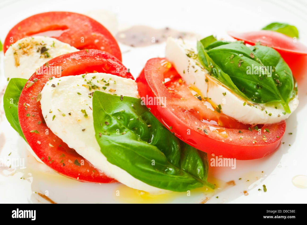 Caprese salad with mozzarella, tomato, basil and balsamic vinegar