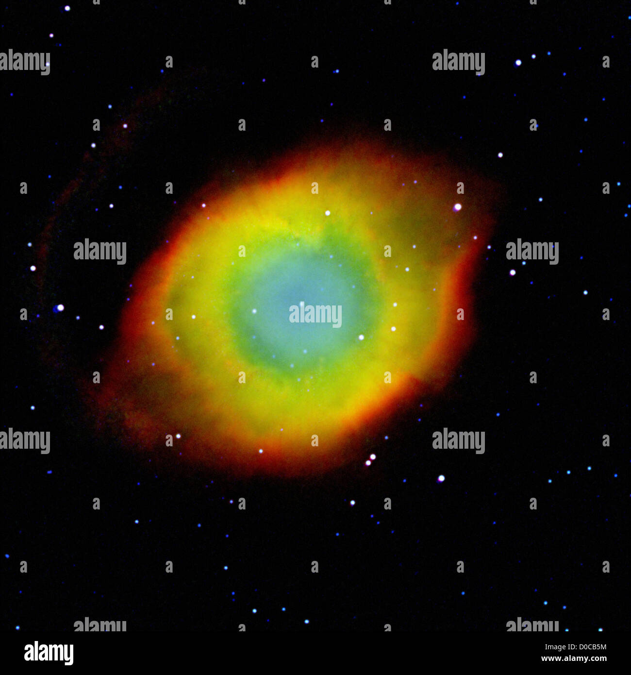 The Helix Nebula planetary nebula also known as NGC 7293 seen in composite multiple exposures taken in wavelengths Helium II Stock Photo