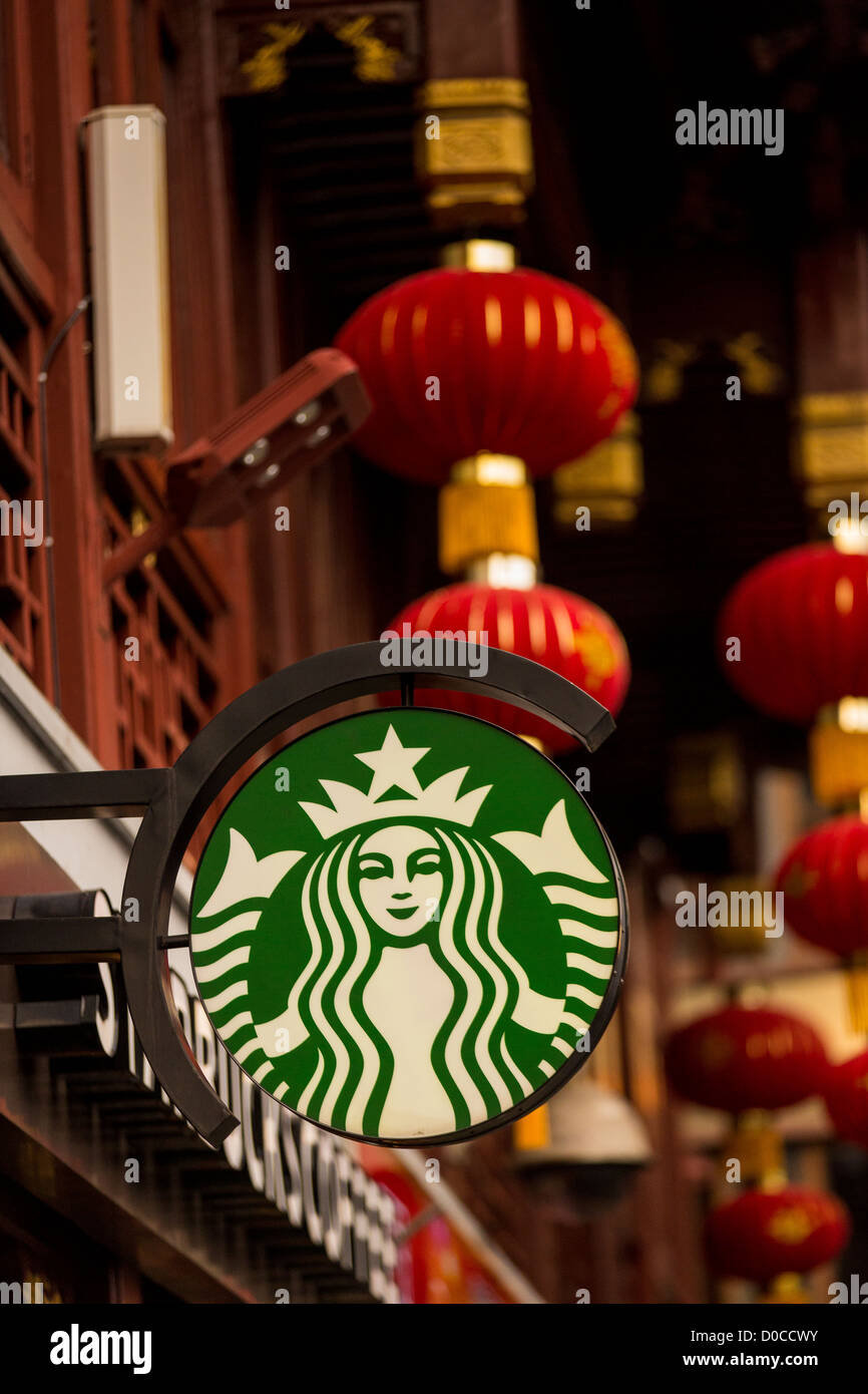 A sign for Starbucks store in the historic Yu Yuan Bazaar Shanghai, China Stock Photo