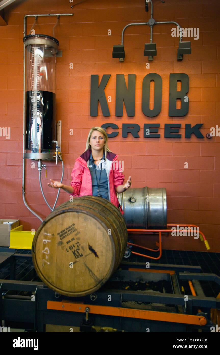 Tour Guide Speaking Emptying Aged Barrelsof Knob Creek Bourbon Whiskey at Jim Beam Distillery in Clermont, Kentucky Stock Photo