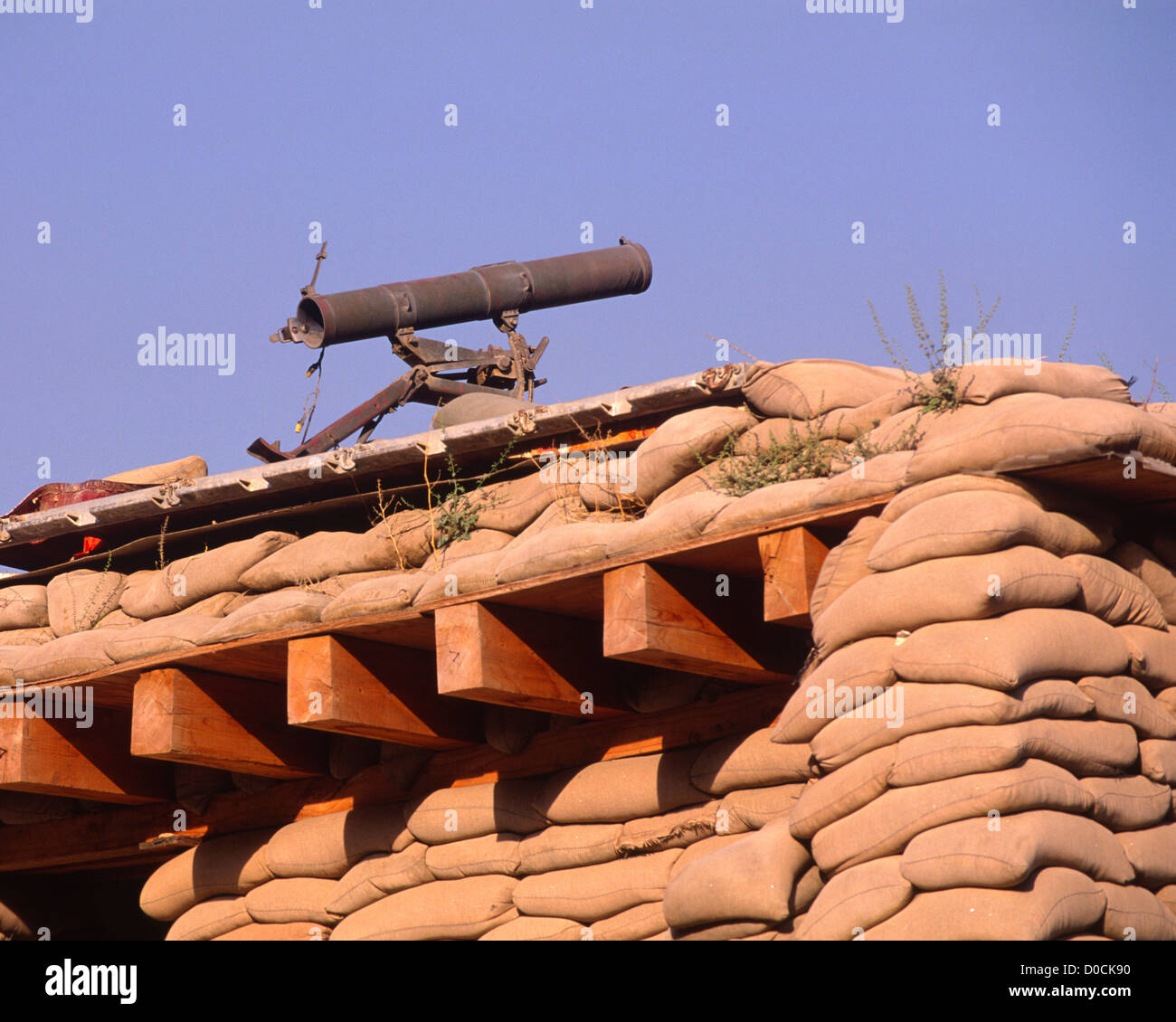 Chinese Manufactured 107mm Rocket Launcher Captured Taliban Stands Ready Atop Sandbagged Bunker Forward Operating Base in Stock Photo