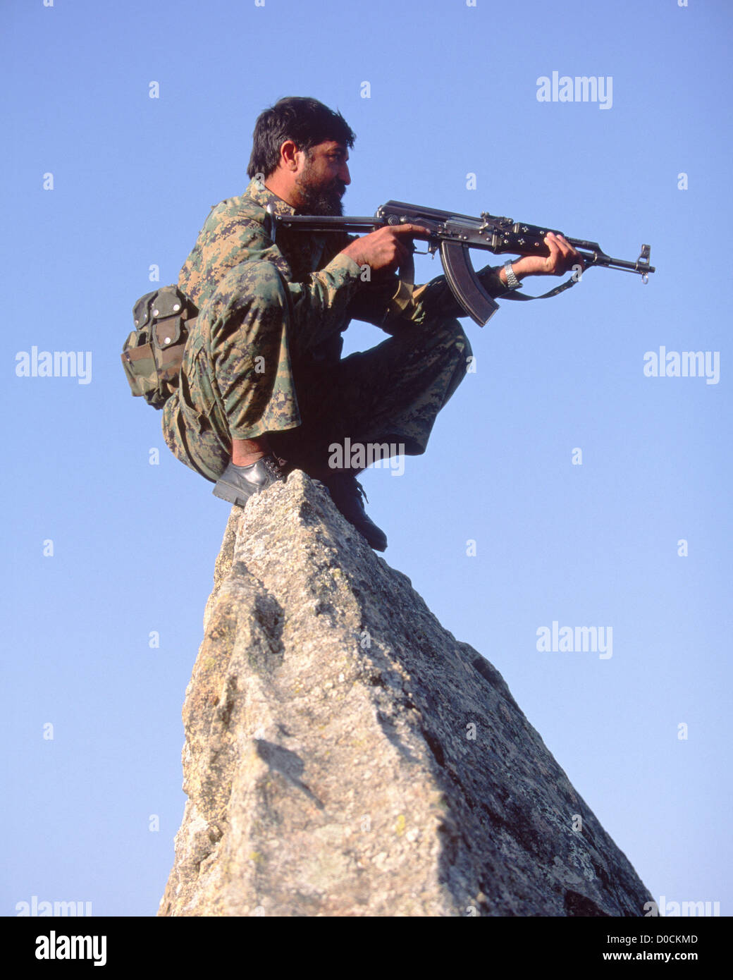 An Afghan Security Forces Soldier Takes Aim Suspected Al Qaeda Training Camp Top Spire In Foothills Afghanistan S Hindu Kush Stock Photo Alamy