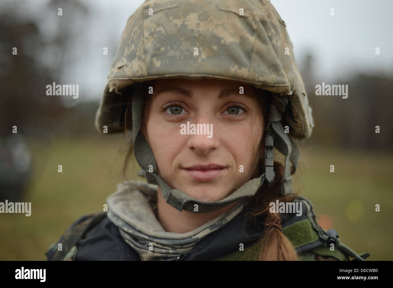 SPANGDAHLEM AIR BASE, Germany -- U.S. Air Force Staff Sgt. Amanda Bailey, 606th Air Control Squadron data systems technician,stands guard during combat readiness training Nov. 15, 2012. Stock Photo