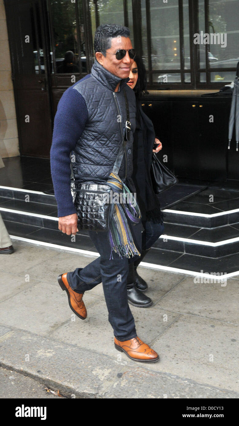 Jermaine Jackson and wife Halima Rashid leaving their hotel and walking