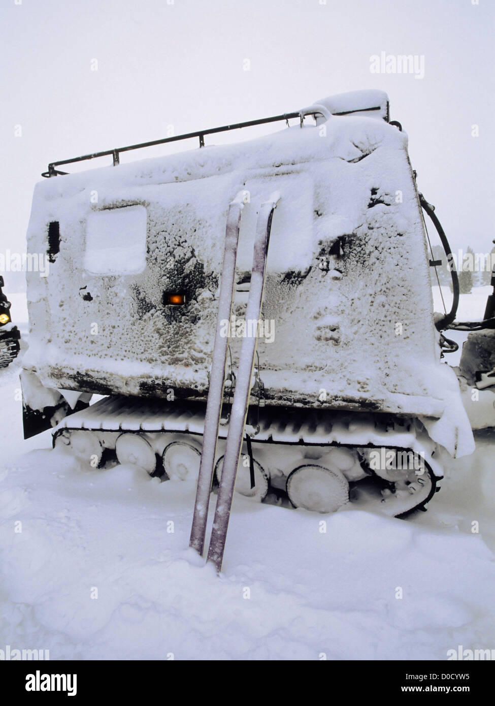 Skis and a Military Snow Vehicle in a Blizzard Stock Photo Alamy