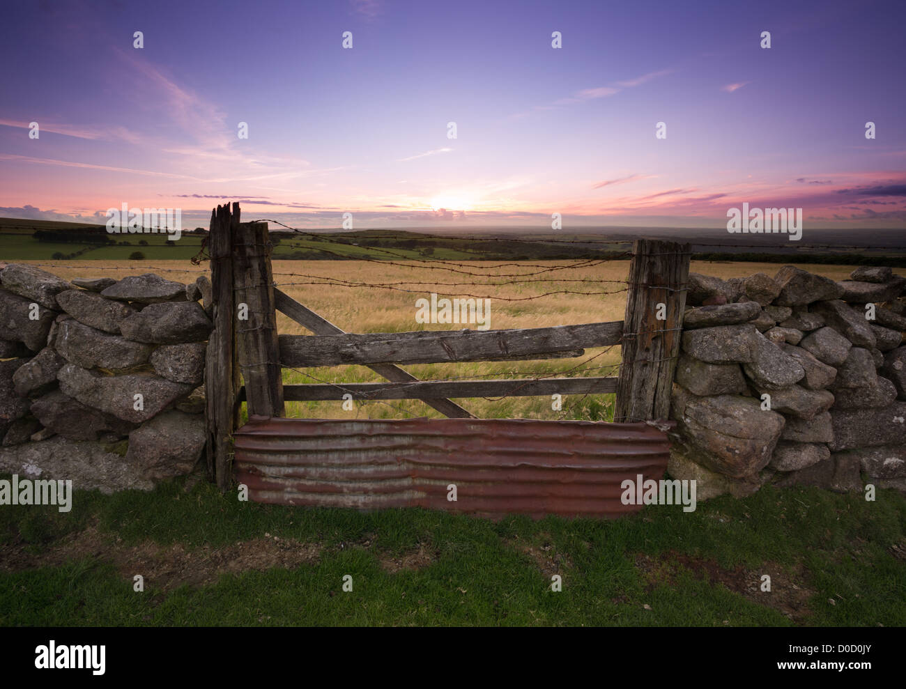 A rustic gateway on Watchet Hill,Belstone at twilight in summer,Dartmoor National Park,Devon,England,Uk Stock Photo