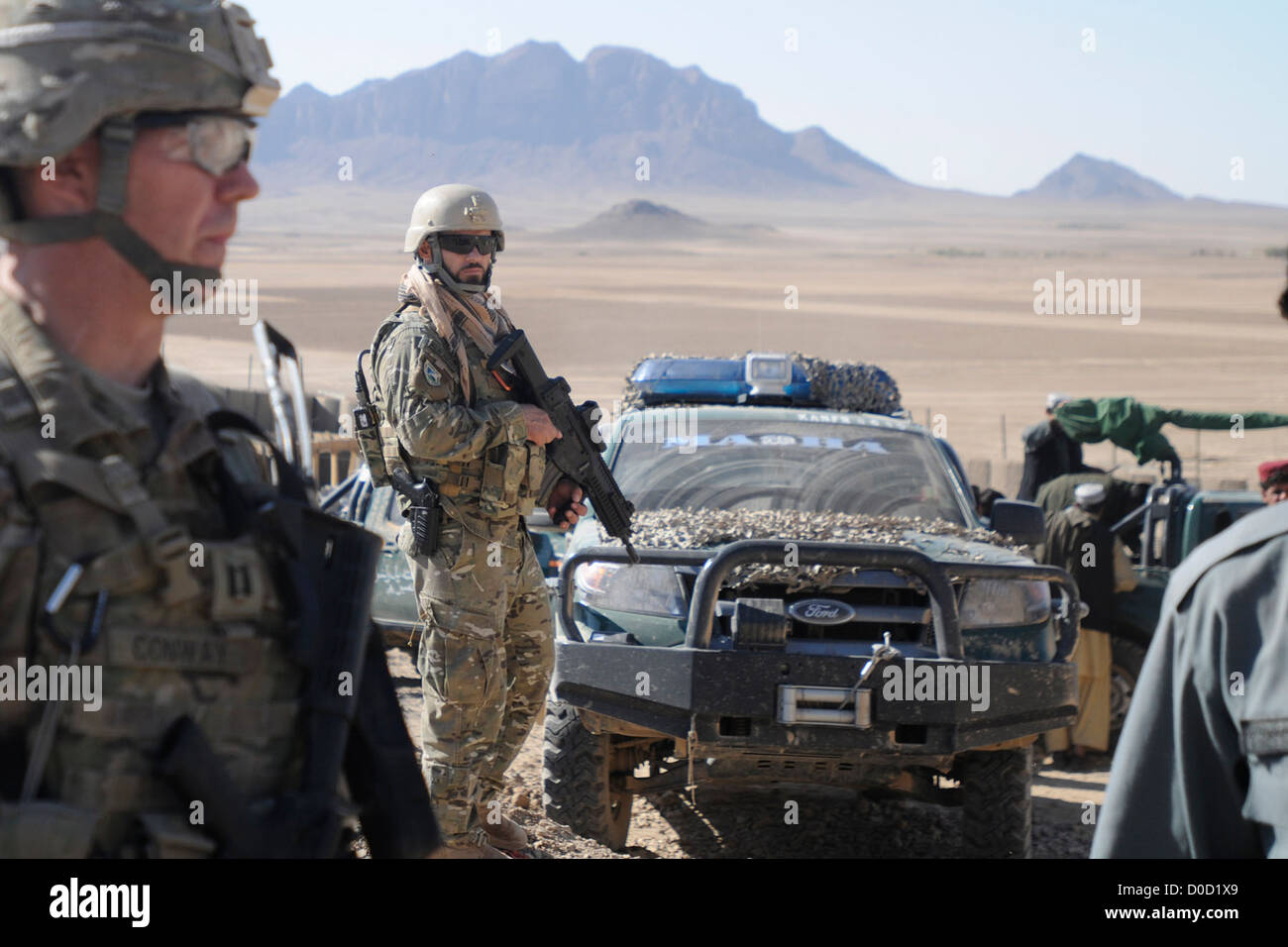 An Albanian Special Forces soldier provides security during an assessment of a police sub-station construction project with coalition forces and Afghan Uniformed Police members in Kandahar province, Afghanistan, Nov. 7, 2012. Stock Photo