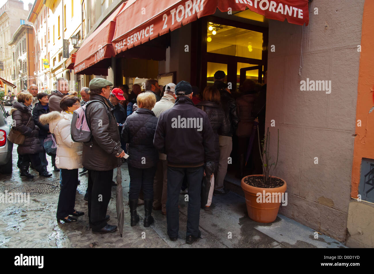 People waiting to get into 2 Torri self service restaurant Quadrilatero central Bologna city Emilia-Romagna, Italy Stock Photo