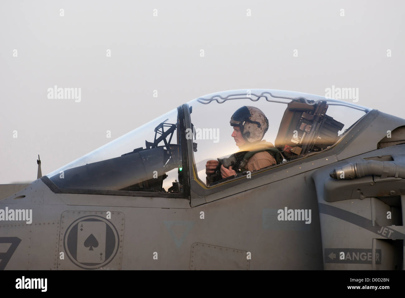 A US Marine Aviator Prepares to Launch His AV-8B Harrier From Al Asad Air Base in Iraq's Al Anbar Province Stock Photo