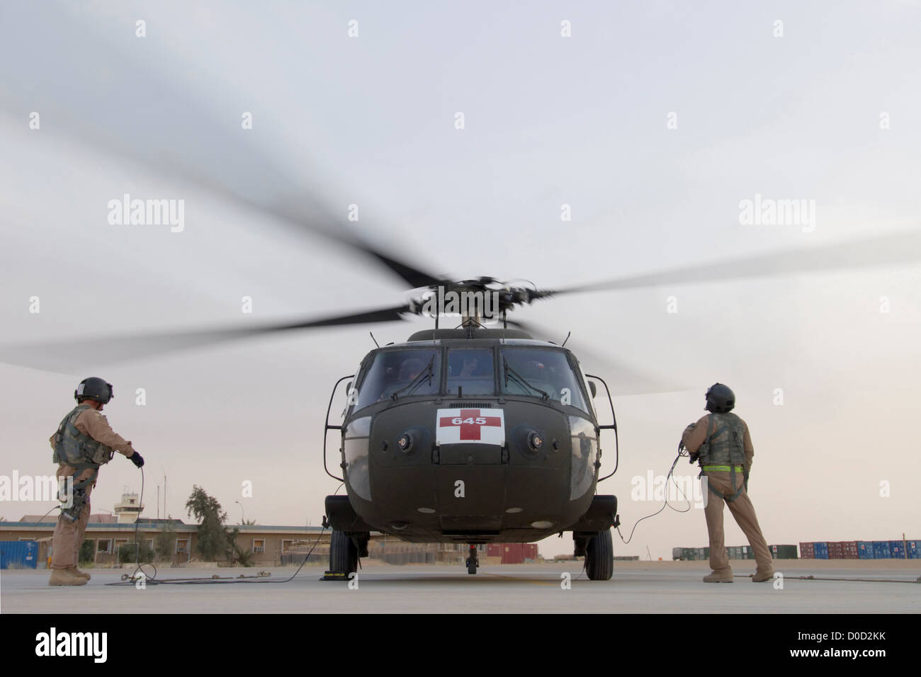 A US Army Blackhawk MEDEVAC Helicopter Prepares Embark on Nighttime Mission Baghdad Al Asad Air Base in Iraq's Al Anbar Province Stock Photo