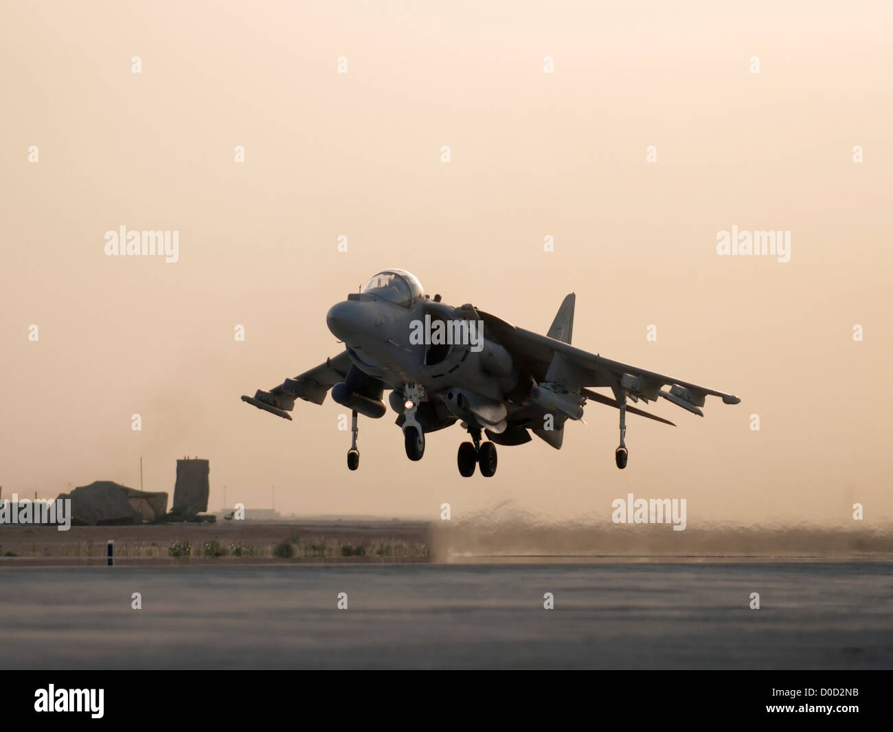 A US Marine Corps AV-8B Harrier Launches at Dawn from Al Asad Air Base in Iraq's Al Anbar Province Stock Photo