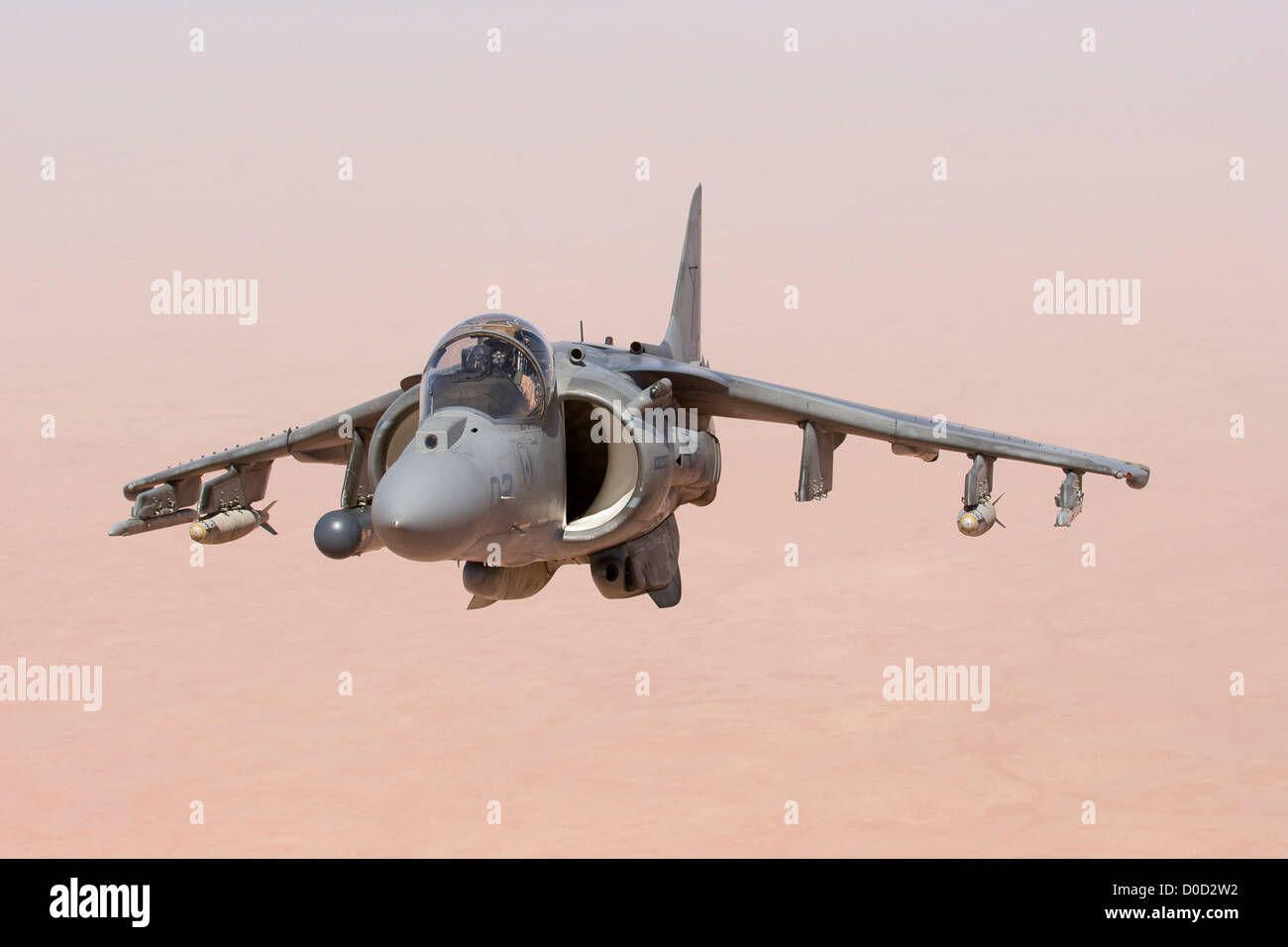 A US Marine Corps AV-8B Harrier High Above the Al Anbar Province of Iraq Stock Photo